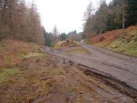 View from the remains of Killin Junction Station. Trackbed on the right was the Callander Line, on the left to Killin. The remains of the famous signal box at centre.<br><br>[John Gray 30/03/2005]