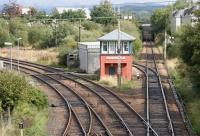 Looking over Fort William Junction on 30 September 2005 with the Mallaig route running off to the left. The branch off the main line into the yard is immediately behind the signal box.<br><br>[John Furnevel 30/09/2005]