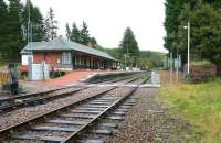 The West Highland station at Tulloch looking towards Glasgow in September 2005. Note the old water tower base on the right. Originally opened as <I>Inverlair</I> in 1894, it was renamed <I>Tulloch for Loch Laggan and Kingussie</I> the following year, before the current shortened version was eventually adopted.   <br><br>[John Furnevel 26/09/2005]