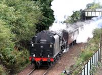 <I>The Jacobite</I>, bound for Mallaig, approaching Fort William Junction past the West Highland Oil terminal in September 2005 behind Black 5 4-6-0 no 45407.<br><br>[John Furnevel 30/09/2005]