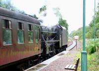 To travel in hope... <I>'You never know, it might be sunny in Mallaig'</I>. Black 5 45407 makes steady progress westbound with <I>The Jacobite</I> through Locheilside station on Saturday 24 September 2005 - in heavy rain!<br><br>[John Furnevel 24/09/2005]