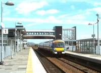 An Edinburgh - Glasgow Queen Street train passing through Edinburgh Park in May 2004.<br><br>[John Furnevel 14/05/2004]