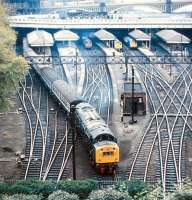 An ECML service from Kings Cross leaves Waverley for Aberdeen in 1975 behind an English Electric Type 4 locomotive.<br><br>[John Furnevel 16/04/1975]