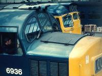 A pair of Glasgow - Edinburgh push-pull shuttle services in the west end bays at Waverley in September 1971. The example nearest is a Type 2 + Type 3 combination, while alongside is what soon became the standard configuration, with a Type 2 at each end. The latter arrangement continued until introduction of the Class 47 + DBSO PP services some 8 years later. <br><br>[John Furnevel 12/09/1971]