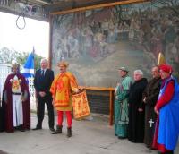 Platform celebration at Arbroath station on 20 October 2009. Photograph  showing the <I>Declaration of Arbroath</I> mural by Charles Anderson, having been presented to Arbroath Station by <i>Arbroath Abbey Timethemes</i>, following inspection during the franchise anniversary tour by ScotRail MD Steve Montgomery.<br><br>[First ScotRail 20/10/2009]