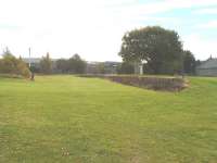 Former Goods platform at Longmorn looking south. Longmorn is three miles south of Elgin. Distillery in background, 14/10/05.<br><br>[John Gray 14/10/2005]