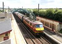 A North Berwick - Edinburgh train arrives at Drem station - July 2005.<br><br>[John Furnevel 15/07/2005]