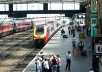 Scene at Carlisle in June 2003 as a late running Birmingham - Glasgow Virgin Voyager arrives at platform 3.<br><br>[John Furnevel 16/06/2003]