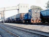 D2416 of 64H, Leith Central, positioning a coal train destined for Cockenzie power station in the loading area at Bilston Glen Colliery, Loanhead, in September 1971.<br><br>[John Furnevel 22/09/1971]