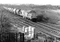 Bishopbriggs - Grangemouth empty tanks at Greenhill Lower Junction in 1988 behind a class 37.<br><br>[John Furnevel 13/12/1988]