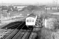 A westbound DMU runs through Greenhill Lower Junction on a bright and sunny 13 December 1988, shortly after leaving Falkirk Grahamston.<br><br>[John Furnevel 13/12/1988]