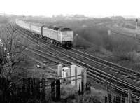 A class 47 with a Glasgow Queen Street - Aberdeen train approaching Greenhill Lower Junction on 13 December 1988.<br><br>[John Furnevel 13/12/1988]