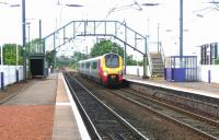 A Virgin Voyager heading for Waverley runs east through Slateford station on 31 May 2005.<br><br>[John Furnevel 31/05/2005]