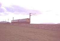 In the last week of service, before the electrics took over, a DMU approaches Largs from Glasgow.<br><br>[John Gray //]