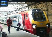 The 1114 Virgin Voyager to Cardiff Central boards at Waverley platform 19 in April 2003.<br><br>[John Furnevel 25/04/2003]