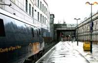 Round the back - the western end of platform 21 at Waverley on a wet and dull morning in December 2004, with a recently arrived and terminated GNER service from Kings Cross at the platform.<br><br>[John Furnevel 08/12/2004]