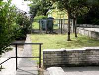 Looking south along the surviving section of platform at the site of Moffat station in July 2004.<br><br>[John Furnevel 30/07/2004]