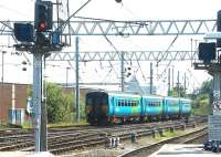 A 4-car Arriva Trains 156 service from Leeds approaching Carlisle station off the S&C on 25 May 2003.<br><br>[John Furnevel 25/05/2003]