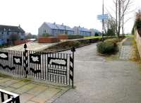 The remains of the station at Bonnyrigg, photographed in March 2005, looking south west from the pavement alongside the B704. The station was the first stop south of Hardengreen Junction on the Peebles Loop and closed to passengers in 1962.<br><br>[John Furnevel 16/03/2005]