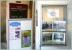 Notices displayed on Peebles High Street on 21 May 2010, marking the entrance to the Scottish Borders Council <I>Going Loco</I> exhibition at the Tweeddale Museum & Gallery. Note the old photograph looking north across the long demolished Tweed Viaduct - centre right [see image 29949].<br><br>[John Furnevel 21/05/2010]