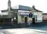 Entrance to Springburn station, Glasgow, from Atlas Road in 2005.<br><br>[John Furnevel 19/02/2005]