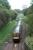 1030 service from Queen Street leaves Kelvindale and is about to pass under the Forth and Clyde Canal.<br><br>[Ewan Crawford 28/09/2005]
