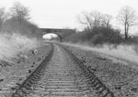 View east from Oakley in 1986 along the old Stirling and Dunfermline Railway route towards Dunfermline Upper.<br><br>[Grant Robertson //1986]