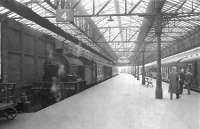 V3 2-6-2T 67628 stands at Helensburgh Central platform 4 on 19 May 1959. What looks to be a classmate is at the head of a Glasgow bound train boarding at platform 3.  <br><br>[G H Robin collection by courtesy of the Mitchell Library, Glasgow 19/05/1959]