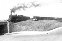 Ex-NB 4-4-0 No 62493 <I>Glen Loy</I> about to cross Kessock Road with the goods on 4 August 1954.<br><br>[G H Robin collection by courtesy of the Mitchell Library, Glasgow 04/08/1954]