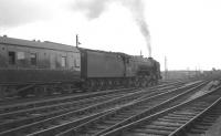 The 9.50am Edinburgh Waverley - Leeds City leaving Carlisle in July 1965 behind A1 Pacific no 60131 <I>Osprey</I>.<br><br>[K A Gray 24/07/1965]