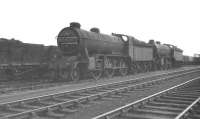 Gresley K2 2-6-0s 61740 and 61766 stand together in the stored locomotive sidings at Immingham awaiting disposal in 1960. Both locomotives are recorded as being officially withdrawn from Colwick shed, Nottingham, in January 1961 and cut up at Doncaster Works later that same month.<br><br>[K A Gray //1960]