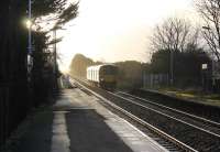 Northern 150138 slows for the stop at Layton station, the first of many on its journey from Blackpool North to Huddersfield via Manchester Victoria on a sunny 10th January 2015. [Ref query 6876] <br><br>[Mark Bartlett 10/01/2015]