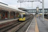 A new footbridge is nearing completion at Altrincham, providing access to all four platforms. Single tram 3016 has just arrived in Platform 1 from Piccadilly. View from the Metrolink buffer stops on 13th January 2015 with the Network Rail platforms on the right. <br><br>[Mark Bartlett 13/01/2015]