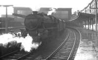 A wet August evening at Carlisle station in 1965 see Black 5 44681 preparing to leave platform 5 with the 1945 stopping service to Carnforth.<br><br>[K A Gray 24/08/1965]