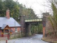 Looking along Main Street towards Newton Lane through the over-bridge that now forms part of the Silverhill trail created on the trackbed of the former Pleasley Colliery branch. <br><br>[David Pesterfield 07/01/2015]