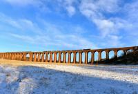 66305 crossing Culloden Viaduct with the southbound container empties for Mossend during a clear and still winter afternoon on 17 January 2015.<br><br>[John Gray 17/01/2015]