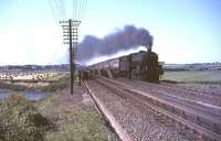 Kingmoor Black 5 no 45106 crossing the River Clyde on Float Viaduct with a southbound military special on 17 July 1965. The train is about to pass over Strawfrank water troughs.<br><br>[John Robin 17/07/1965]