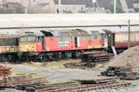 Another West Coast Railways spares donor photographed at Carnforth on 5 January 2015. Former Rail Express Systems Brush Type 4, 47492 (D1760), stands among other withdrawn locos providing parts to keep the West Coast main line Class 47 fleet in service. <br><br>[Mark Bartlett 05/01/2015]