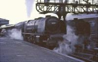 The London sleeper at Carstairs station on 31 July 1964 behind Stanier Coronation Pacific 46244 <I>King George VI</I>. Standing alongside is Britannia 70002 <I>Geoffrey Chaucer</I>. <br><br>[John Robin 31/07/1964]