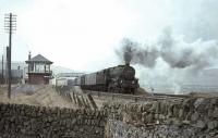 Black 5 no 45364 climbs south through Elvanfoot with a parcels train on 25 March 1966 in light snow.   <br><br>[John Robin 25/03/1966]