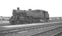 BR Standard Class 4 2-6-4T 80101 standing in the shed yard at Pwllheli in the summer of 1962.<br><br>[K A Gray 14/08/1962]