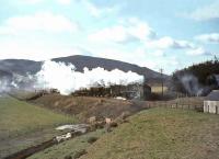 Britannia Pacific 70046 <I>Anzac</I> approaching Symington with a down ballast train on 25 March 1966.<br><br>[John Robin 25/03/1966]