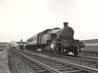 Stanier 2-6-2T 40188 photographed leaving Whiteinch Riverside station on 9 August 1957 with a Dalmuir Riverside - Rutherglen train.<br><br>[G H Robin collection by courtesy of the Mitchell Library, Glasgow 09/08/1957]