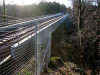 The deck of Glenesk Viaduct looking south into the sun towards Eskbank in February 2015 [see image 39780].<br><br>[John Furnevel 01/02/2015]