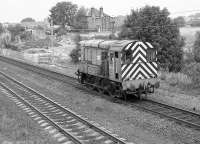 08793 (in lined apple green livery) on its way from Millerhill depot to Leith South yard approaching the future site of Brunstane Station on 25 July 1989.<br><br>[Bill Roberton 25/07/1989]