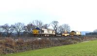 DRS 37259 and 37602 with the nuclear flask special for Georgemas Junction have just passed Beauly on 2 February 2015 on their way north.<br><br>[John Gray 02/02/2015]