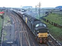 Class 40 D210 (formerly <I>Empress of Britain</I> but running without nameplates) and class 50 D414 double-head the combined 10:50 Glasgow Central and 10:50 Edinburgh to Birmingham New Street (1M23) away from Carstairs on 23 May 1970. On this occasion the Edinburgh portion had been worked by another EE Type 4, D263.<br><br>[Bill Jamieson 23/05/1970]