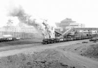 Industrial steam in action at Polkemmet Colliery, Whitburn, on a cold and frosty February morning in 1972. A pair of NCB Pugs is getting underway with a trainload of coal destined for the BR exchange sidings on Polkemmet Moor. <br><br>[John Furnevel 11/02/1972]