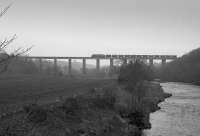 37676 with coal from Killoch crossing Enterkine Viaduct on 17 April 1989.<br><br>[Bill Roberton 17/04/1989]