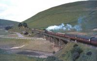 Black 5 44715 heading north over Harthope Viaduct on 31 July 1965. The train is the summer Saturday 0945 Blackpool North - Glasgow Central, which had seen an improvement in the weather since leaving Carlisle earlier [see image 50133].<br><br>[John Robin 31/07/1965]